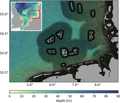 Tidal mitigation of offshore wind wake effects in coastal seas